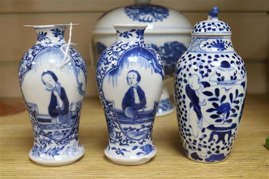 A Chinese blue and white bowl, liner and cover and three vases